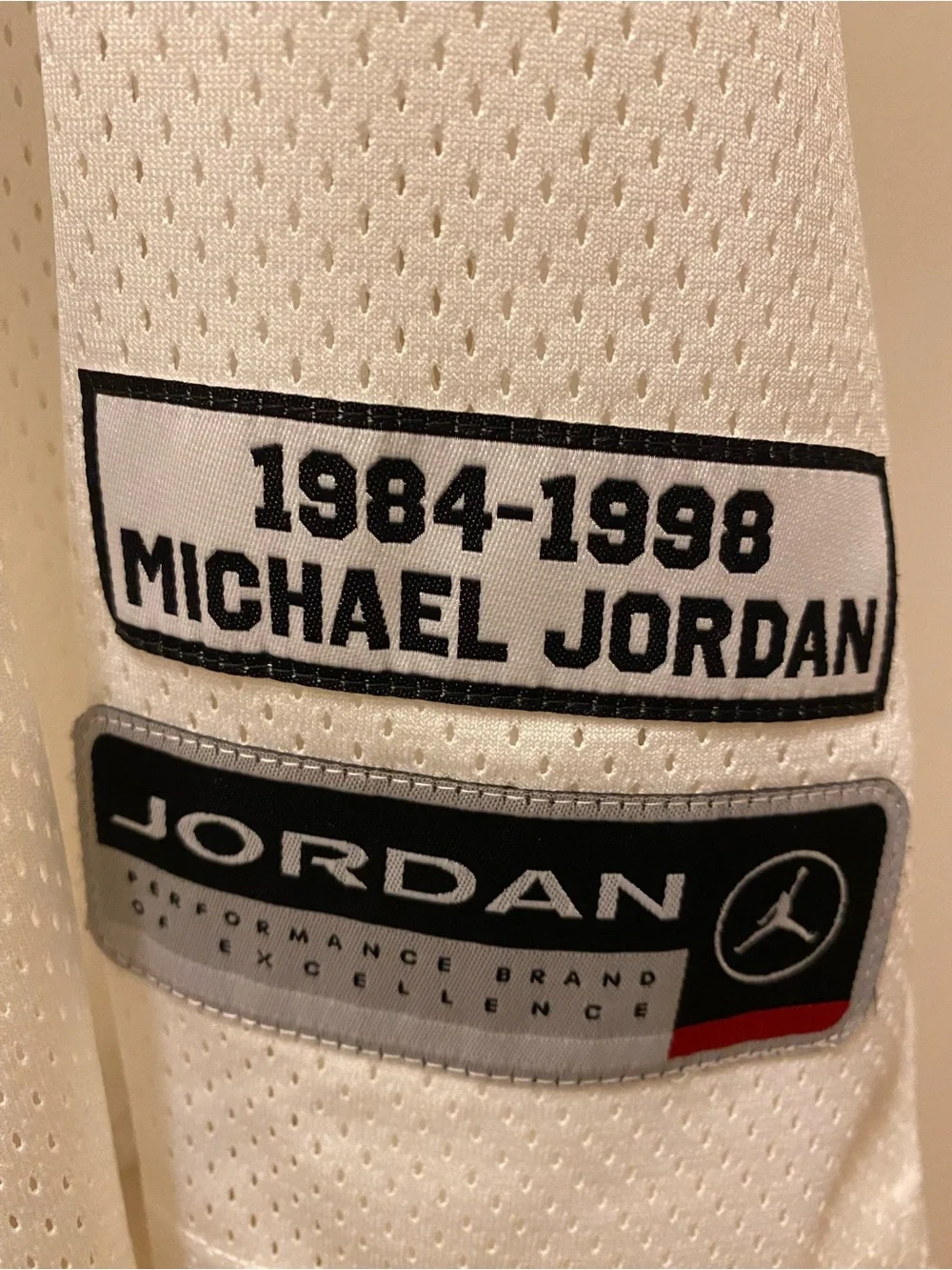 Jordan White Basketball Jersey Patch with Black & Red Accents